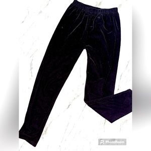 Girls black velour joggers.